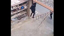 Woman left hanging from a roof, toddler saves her from injury: Watch