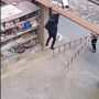 Woman left hanging from a roof, toddler saves her from injury: Watch