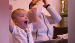 Kid acts like his dad while watching a football match, his cute: Viral
