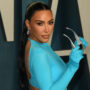 Kim Kardashian dazzles in a silver sequin outfit for christmas eve