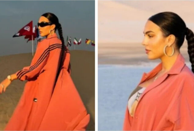 Georgina Rodriguez enjoys in desert while wearing orange sports coat