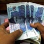 Rupee continues to drop in interbank