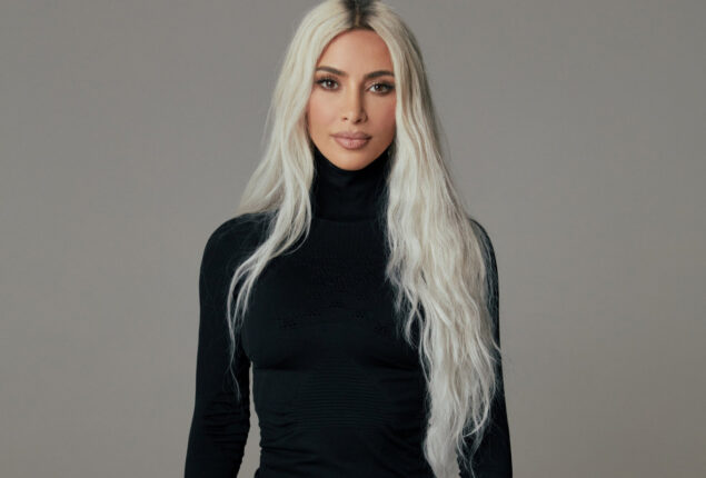Kim Kardashian displays her raw hair