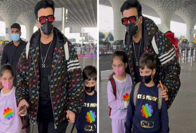 Karan Johar jets off with twins Yash and Roohi from airport