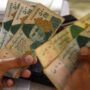 Rupee continues to fall against dollar