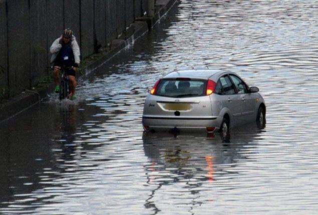 Heavy rain causes floods and travel disarray across UK