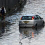 Heavy rain causes floods and travel disarray across UK