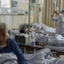 China reports almost 60,000 Covid-related deaths in 1 month