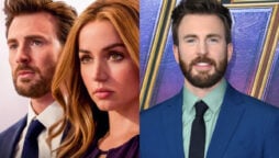 Chris Evans and Ana de Armas are back together in the first “Ghosted” poster