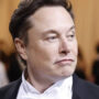 Elon Musk gives a hug to a YouTuber