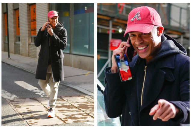 T.J. Holmes smiles despite affair allegations