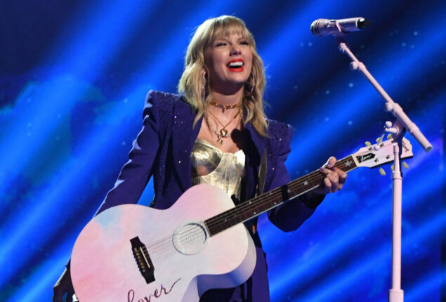 Taylor Swift guitar, Eminem shoes among items in charity auction