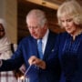 King Charles and Queen Consort Camilla light candles on Holocaust day