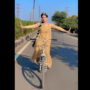 Girl ride bicycle while dancing on song by Alka Yagnik, Kumar Sanu