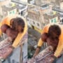 Video of construction worker toiling on high-rise without safety