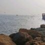 Young woman jumps into sea in Karachi