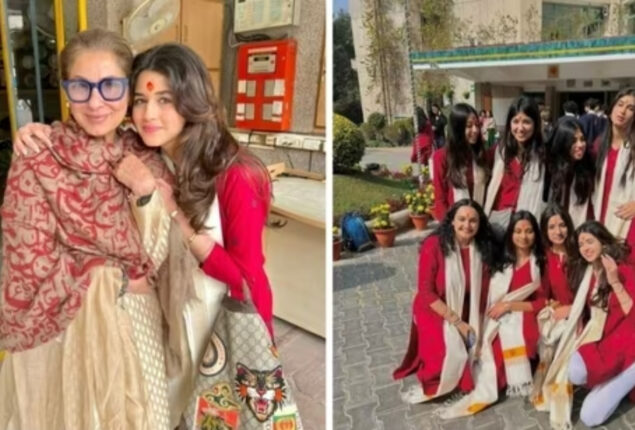 Dimple poses with her granddaughter at her graduation ceremony