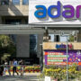 How India’s scandal-hit Adani Group silences critics