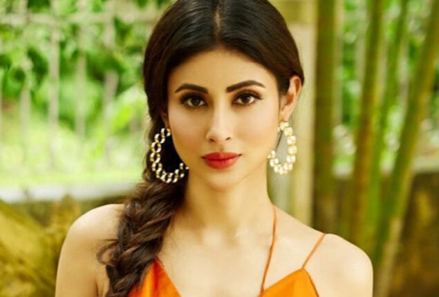 The white bodycon dress that Mouni Roy is wearing is the ideal way to enter the TGIF Mood