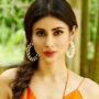 The white bodycon dress that Mouni Roy is wearing is the ideal way to enter the TGIF Mood