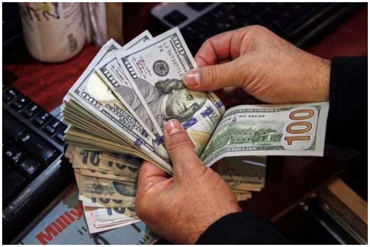 Rupee gains against dollar