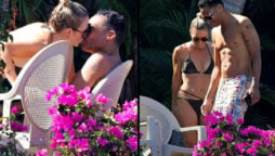 Amy Robach and T.J. Holmes poolside kiss on their Mexico vacation