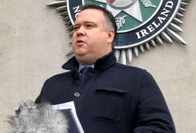 Three men detained after Northern Ireland detective shot