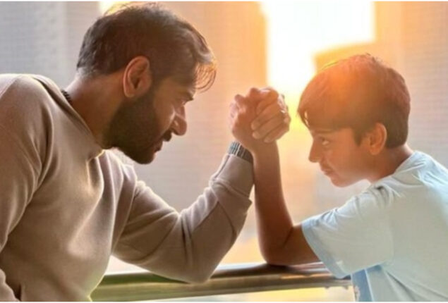 Ajay Devgn and his son face off in an intense arm wrestling battle