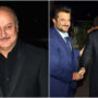 Anupam Kher hugs Anil Kapoor at an event