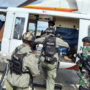 A rescue effort for hostages, including an Australian scholar, is underway in Papua New Guinea