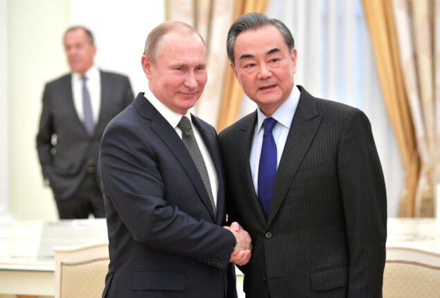 While Biden visits Ukraine, China’s top diplomat heads to Moscow