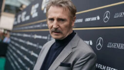 Liam Neeson recalls his first scene in ironic “Taken” as corny