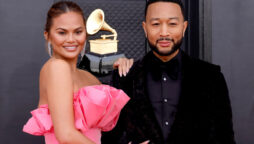 John Legend feels “happy” to change his daughter’s diapers