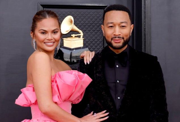 John Legend feels “happy” to change his daughter’s diapers