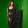 Amna Illyas sizzles in a glitzy black see-through saree