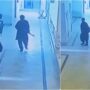 CCTV of terrorists carrying weapons at police chief office surfaces