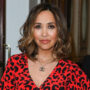 Myleene Klass shows dance moves in a hot pink swimsuit in snow