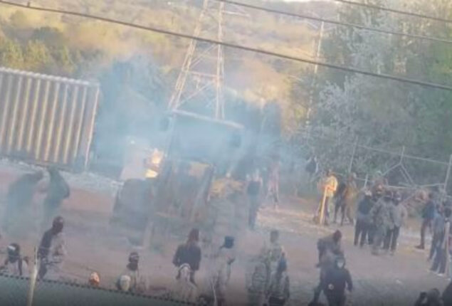 Dozens detained after construction vehicle set ablaze in Atlanta