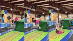 Jumping with holding barbell