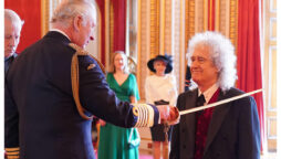 Brian May was knighted by King Charles at Buckingham Palace