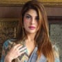 Jacqueline Fernandez sparkles in a cutout silver bodycon dress
