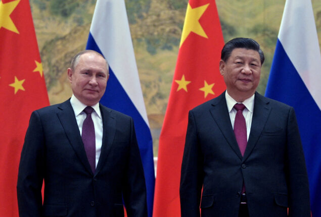 Chinese President Xi Jinping holds large-group talks with Russian President Putin