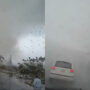 Tornado fury spot on camera, woman gets thrown on road