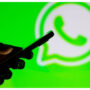 How can you restore a deleted WhatsApp conversation?