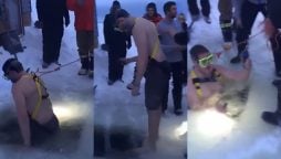 Viral Video: Man Dives into Icy Water to Rescue Friend’s Phone
