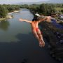 Kosovo Bridge Divers Overcome Fear in Annual Competition