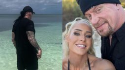 Undertaker's Wife Posts Video of Husband Staring Down Shark
