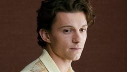 Tom Holland responds to LGBT scene in “The Crowded Room”
