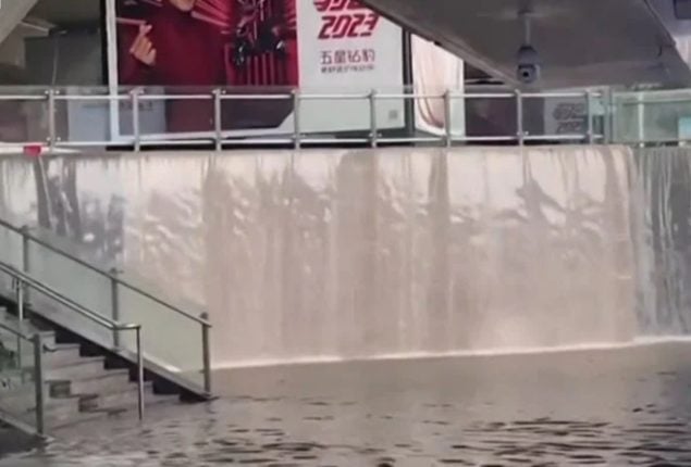 Waterfalls appear in train station after heavy rains in eastern China