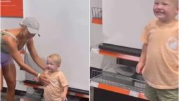 Toddler’s passport photo attempt goes viral